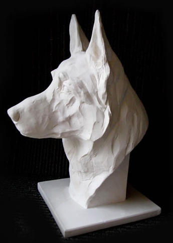 Portrait sculkpture of a german shepherd dog entitled 'ACHTUNG' (hydrastone edition